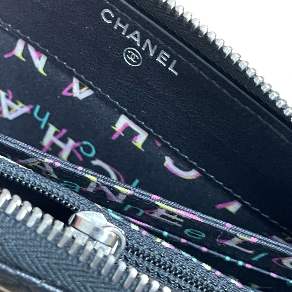 CHANEL Black Quilted Zip Wallet with CC Logo